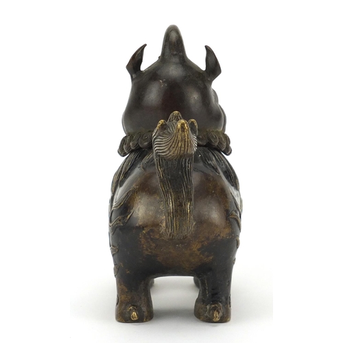 565 - Chinese patinated bronze Dog-Of-Foo incense burner, character marks to the base, 17.5cm high