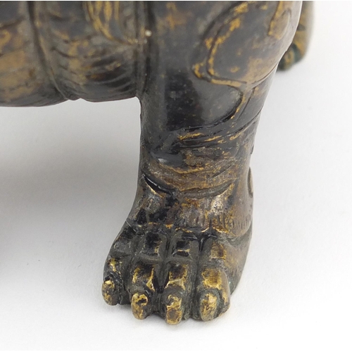 565 - Chinese patinated bronze Dog-Of-Foo incense burner, character marks to the base, 17.5cm high