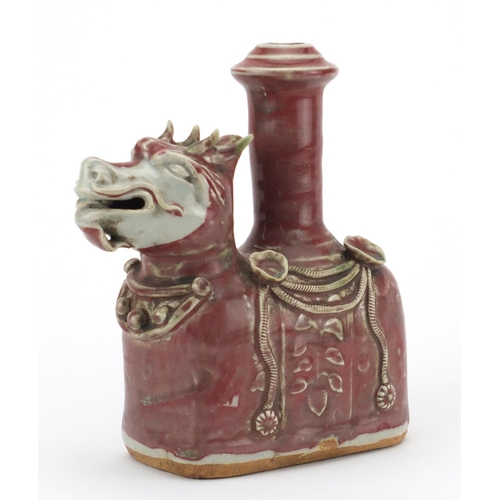 489 - Chinese stoneware dragon vase, having a red and celadon glaze, 20.5cm high