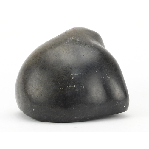 652 - Large Inuit stone carving of a young seal, incised BTAKA to the base, 13cm H x 15cm W x 17cm D