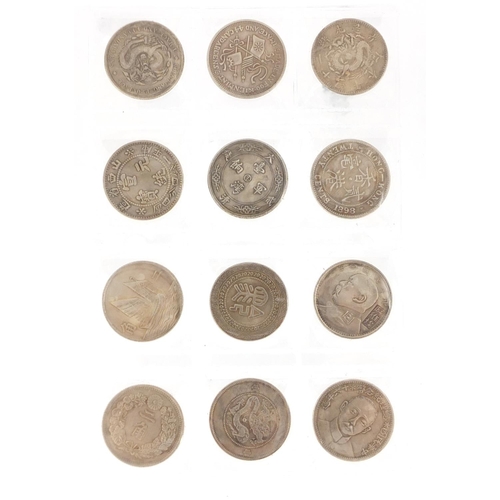 652 - Thirty six Chinese silver coloured metal coins, each 2.5cm in diameter
