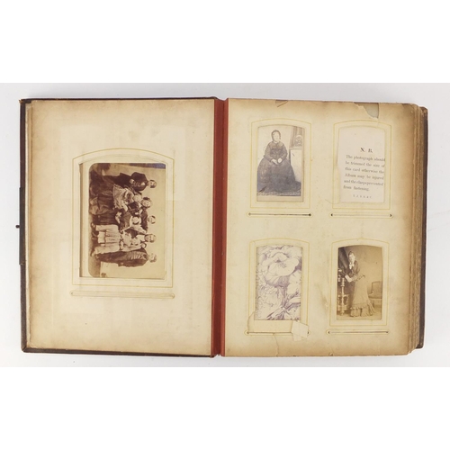 858 - Victorian leather bound photograph album with black and white cabinet cards and photographs, 30cm hi... 