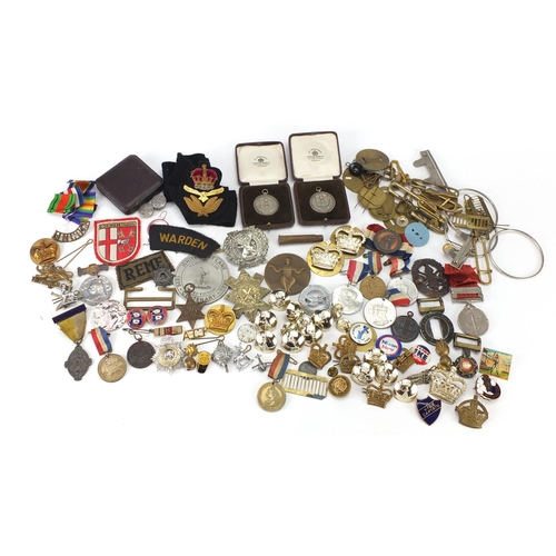 896 - Objects including Military cap badges, pips and vintage badges