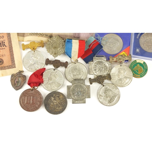 660 - British coins and commemorative medallions including an 1892 crown and commemorative 2006 five pound... 