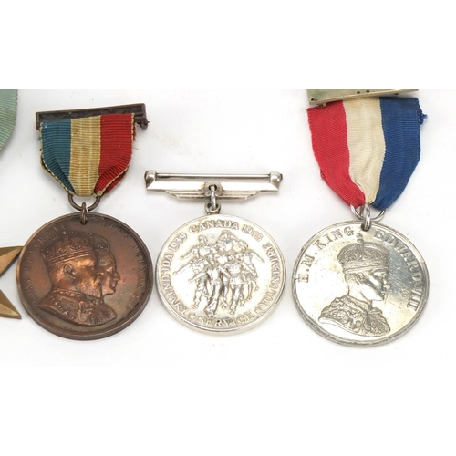897 - British medals and commemorative medallions including the 1939-1945 star and Canadian voluntary serv... 