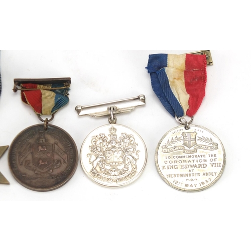 897 - British medals and commemorative medallions including the 1939-1945 star and Canadian voluntary serv... 