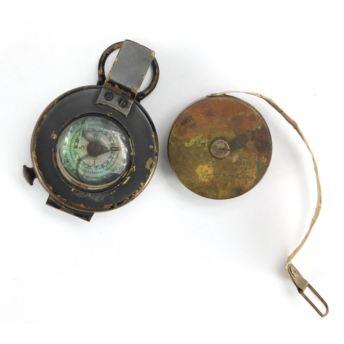 900 - British Military issue TG Co Mk III compass and a Webo tape measure
