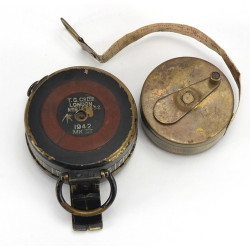 900 - British Military issue TG Co Mk III compass and a Webo tape measure