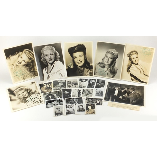 293 - Mostly black and white photographs of Ginger Rogers, some signed in ink, the largest 25cm x 20cm exa... 