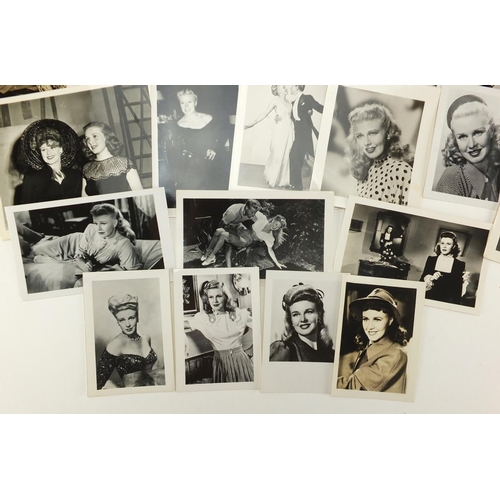 293 - Mostly black and white photographs of Ginger Rogers, some signed in ink, the largest 25cm x 20cm exa... 