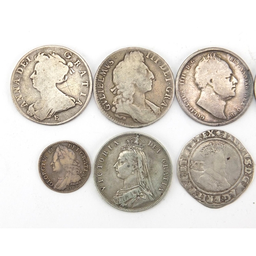 223 - Antique British coinage including a hammered James I 1606 shilling, Queen Anne 1707 half crown, Will... 