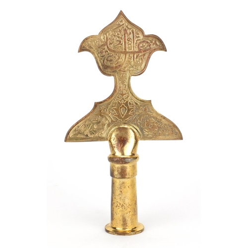 620 - Islamic tombak copper alem finial engraved with script, 30cm high