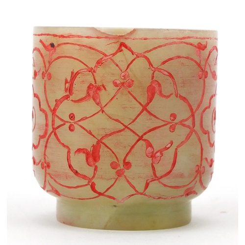 608 - Islamic pale green jade cup engraved with foliate motifs, 5.5cm high
