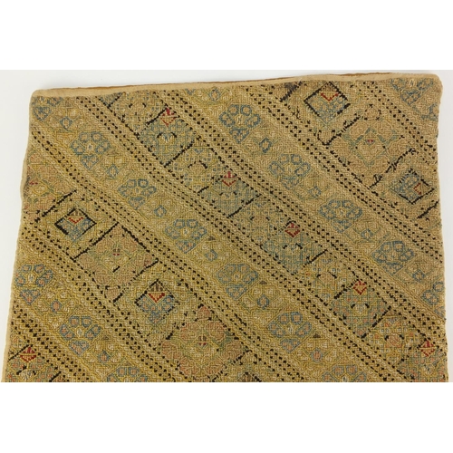 632 - Islamic textile depicting floral motifs, 47cm x 38cm