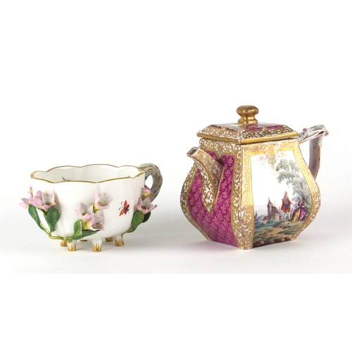 713 - Meissen floral encrusted demitasse cup and a pink ground teapot hand painted with panels of figures ... 