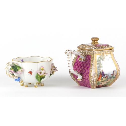 713 - Meissen floral encrusted demitasse cup and a pink ground teapot hand painted with panels of figures ... 