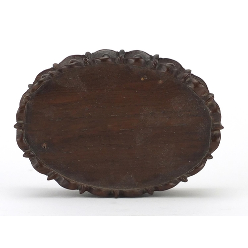 581 - Chinese carved hardwood lotus stand, 5cm H x 13cm W