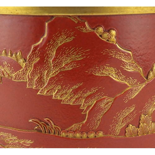 443 - Chinese porcelain iron red brush pot, decorated in relief and gilded with qilins in a landscape, fou... 