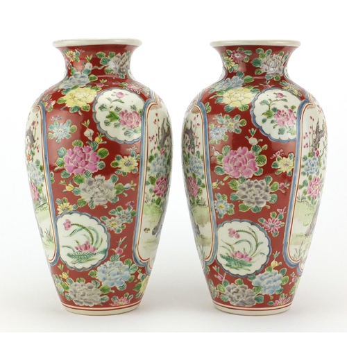 509 - Pair of Japanese porcelain vases, hand painted with geese, trees and flowers, character marks to the... 