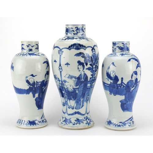 472 - Three Chinese blue and white porcelain baluster vases including a pair, each hand painted with figur... 