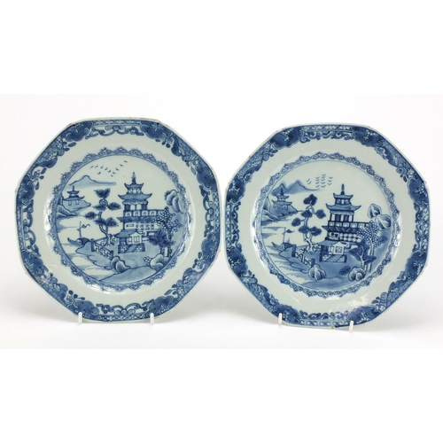 2423 - Pair of Chinese blue and white porcelain plates, hand painted with river landscapes, each 23cm in di... 