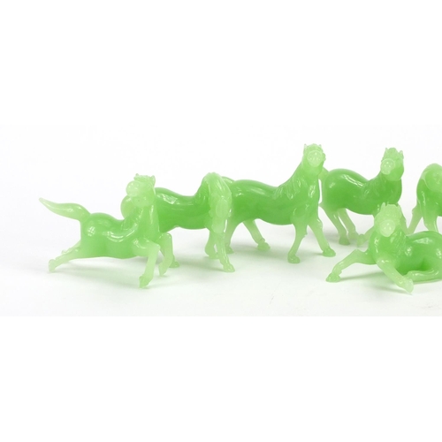 2782 - Eight Chinese green jadeite horses, the largest approximately 7.5cm wide