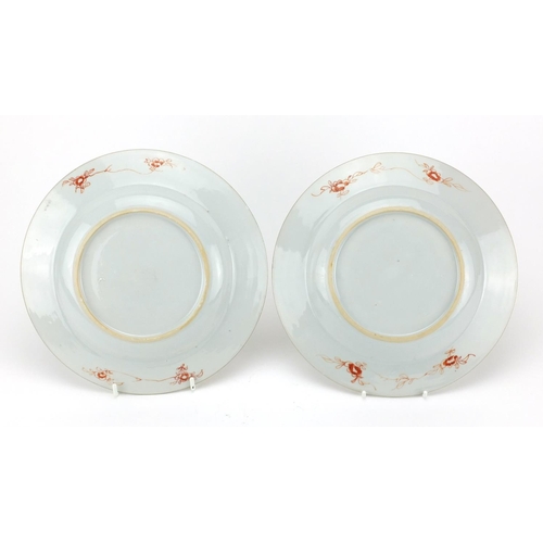 390 - Pair of Chinese porcelain plates, each hand painted with a central roundel enclosing a landscape wit... 