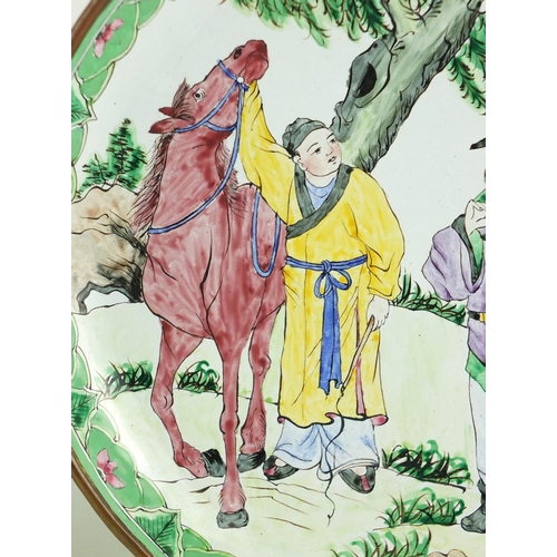 555 - Pair of Chinese Canton enamel dishes, hand painted with figures and horses in a landscape, each 20cm... 