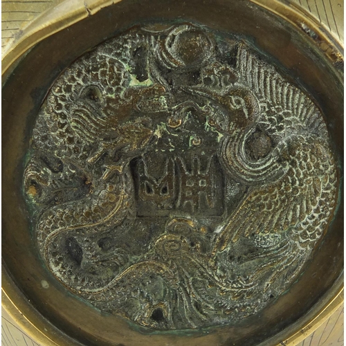 567 - Chinese bronze double gourd vase, engraved with dragons chasing the flaming pearl amongst clouds, ch... 