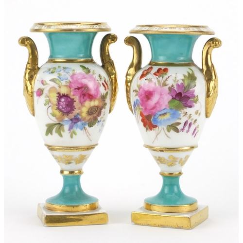 684 - Pair of miniature 19th century porcelain pedestal vases with twin handles hand painted with flowers,... 