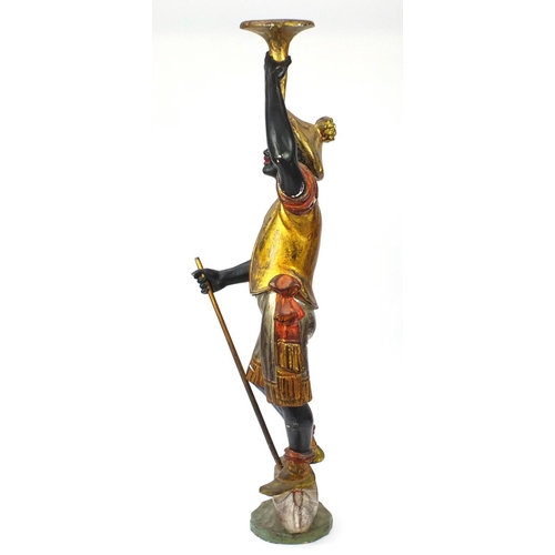 11 - 19th century Venetian gesso and carved wood Blackamoor holding a torch aloft standing upon a gondola... 