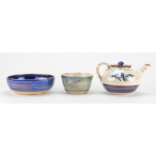 787 - Alvin F Irving lustreware studio ceramics comprising a teapot and two bowls, hand painted with leafs... 