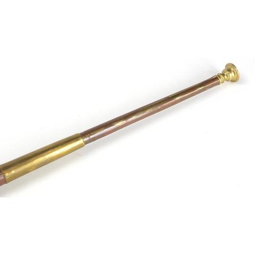 261 - Copper and brass hunting horn, 91cm in length