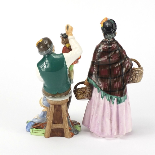 2620 - Two Royal Doulton figures, The Puppetmaker HN2253 and The Orange Lady HN1759, the largest 21.5cm hig... 