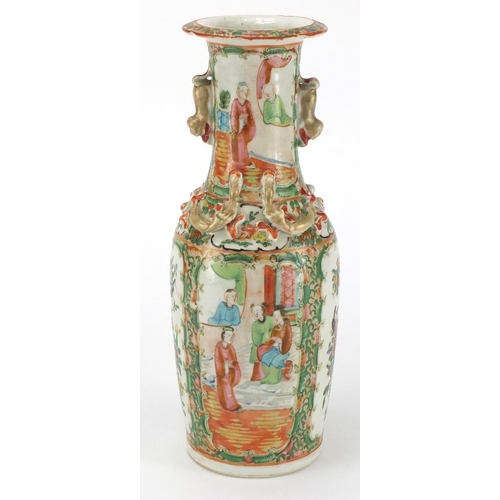 2394 - Chinese porcelain Canton vase with twin handles, hand painted in the famille rose palette with figur... 