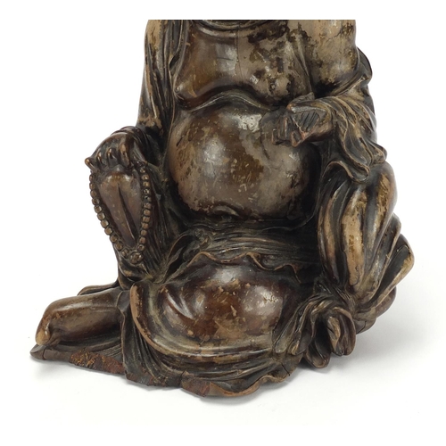 584 - Chinese hardwood carving of seated Buddha, 29cm high