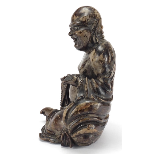 584 - Chinese hardwood carving of seated Buddha, 29cm high