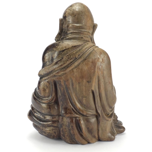 584 - Chinese hardwood carving of seated Buddha, 29cm high