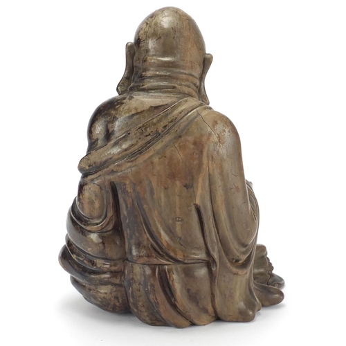 584 - Chinese hardwood carving of seated Buddha, 29cm high