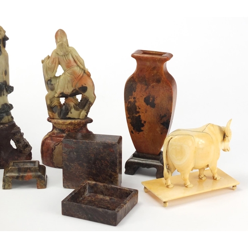 559 - Chinese carved ivory water buffalo and a group of soapstone including a puzzle housed in a box, twin... 