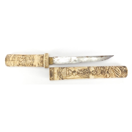 513 - *Description amended 04-05-19* Japanese bone sword with steel blade carved with warriors, 31cm in le... 