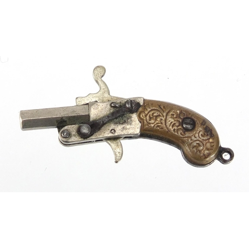81 - 19th century miniature percussion pistol possibly Austrian, 4cm in length