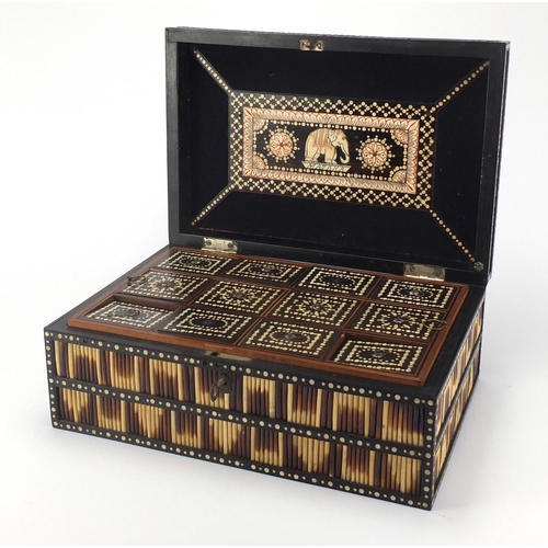 643 - Anglo-Indian porcupine quill box with ivory inlay, the hinged lid opening to reveal a lift out inter... 