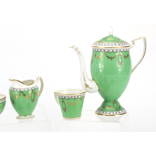 2358 - Duchess china six place coffee service, decorated with flowers and swags, the coffee pot 20.5cm high