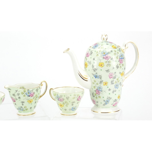 2306 - Foley six place coffee service, decorated with flowers, the coffee pot 18.5cm high