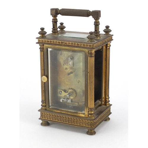 2271 - French brass cased carriage clock with architectural columns, silvered chapter ring and Arabic numer... 