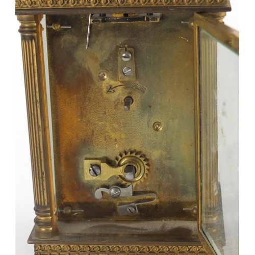 2271 - French brass cased carriage clock with architectural columns, silvered chapter ring and Arabic numer... 