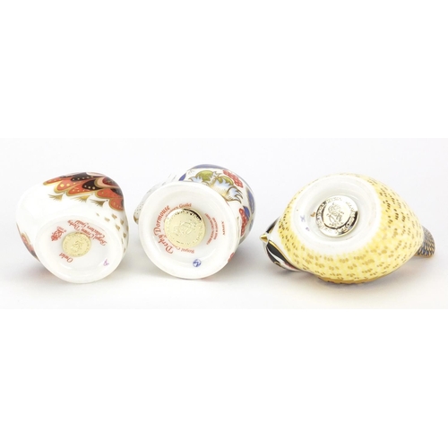 2534 - Three Royal Crown Derby paperweights with stoppers comprising owlet, dormouse and a bird, the larges... 