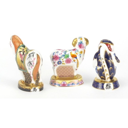 2599 - Three Royal Worcester Chinese year candle snuffers comprising sheep, horse and monkey, the largest 9... 