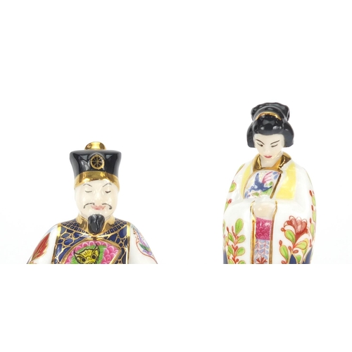 2596 - Two Royal Worcester candle snuffers comprising Emperor and Empress, limited edition 294 and 331/500,... 